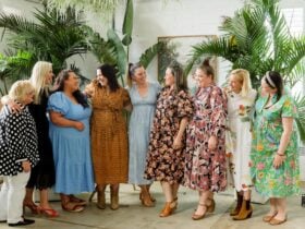 Ten women joining in a good laugh
