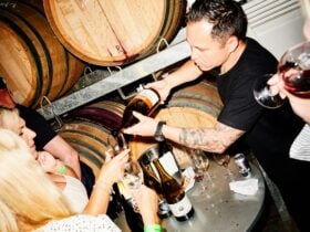 Winemaker pouring wine