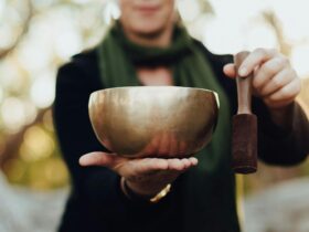 Natalie holding singing bowl outside near Castlemaine
