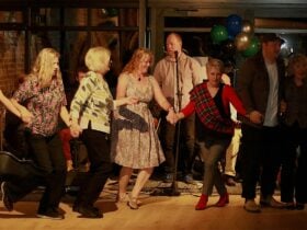 People dancing in a circle