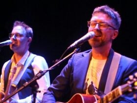 Music Legends Productions band performing live on stage.