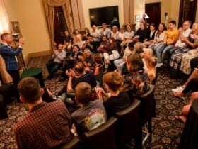 Magician performing in front of a crowd