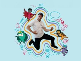 Martin Heppell surrounded by animated characters