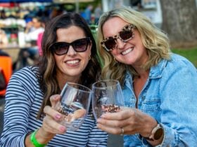 Two attendees enjoying the festival