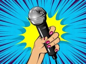 Pop art hand holding a microphone against a bright comic-style burst.