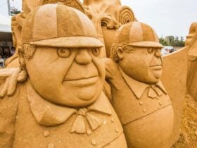 sand sculptures of Tweedledum and Tweedledee