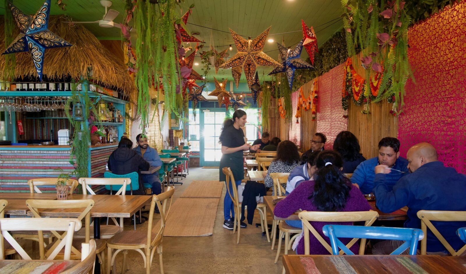 A colourful bustling Indian restaurant