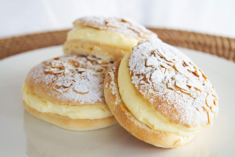 Eating a Beechworth Bakery Beesting - voted a Victorian Top 100 must-do!