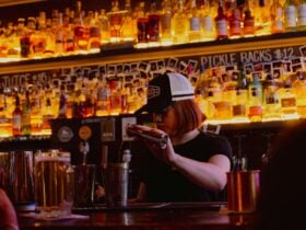 Bartender serves drinks