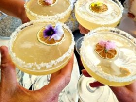 People toasting with margarita cocktails