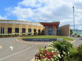 Blue sky with North Ballarat Sports Club entrance in foreground