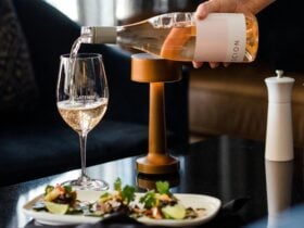 Bottle of Rutherglen rose being poured into a glass to enjoy with an entree dish