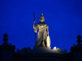 Statue of Minerva at top of building