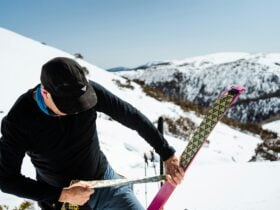 Man with skiiing equipment