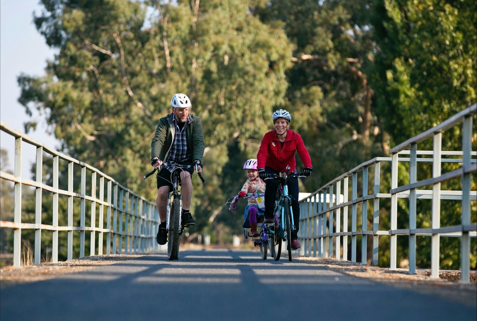 Myrtleford Cycle Centre owners, Steve and Claire with Emlyn, are also cyclists