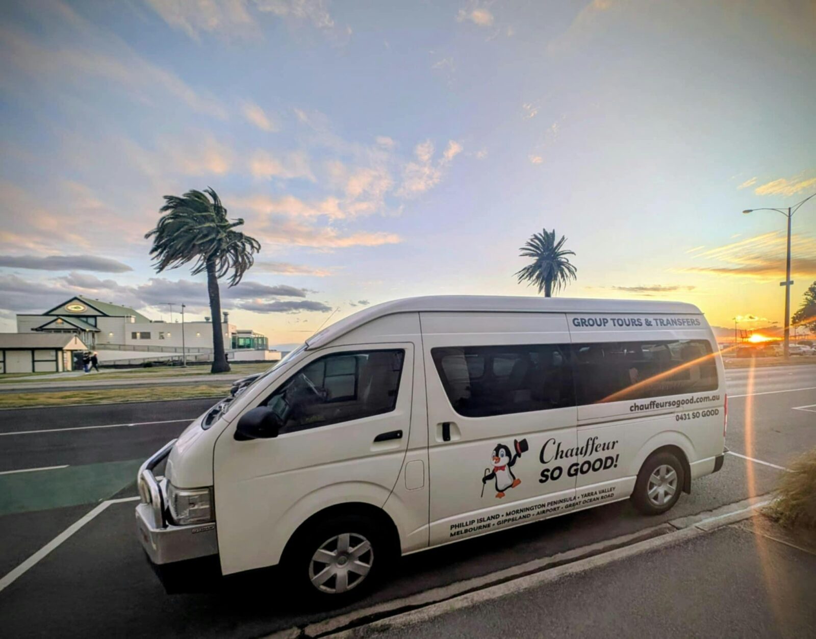 VIPVAN on the esplanade in Melbourne. Sunset and ocean in the background.