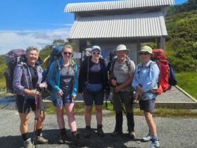 Hikers preparing for the Alpine Crossing at Heathy Spur