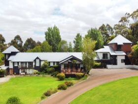 Beautiful black and white lodge-style building overlooking the Southern Ocean
