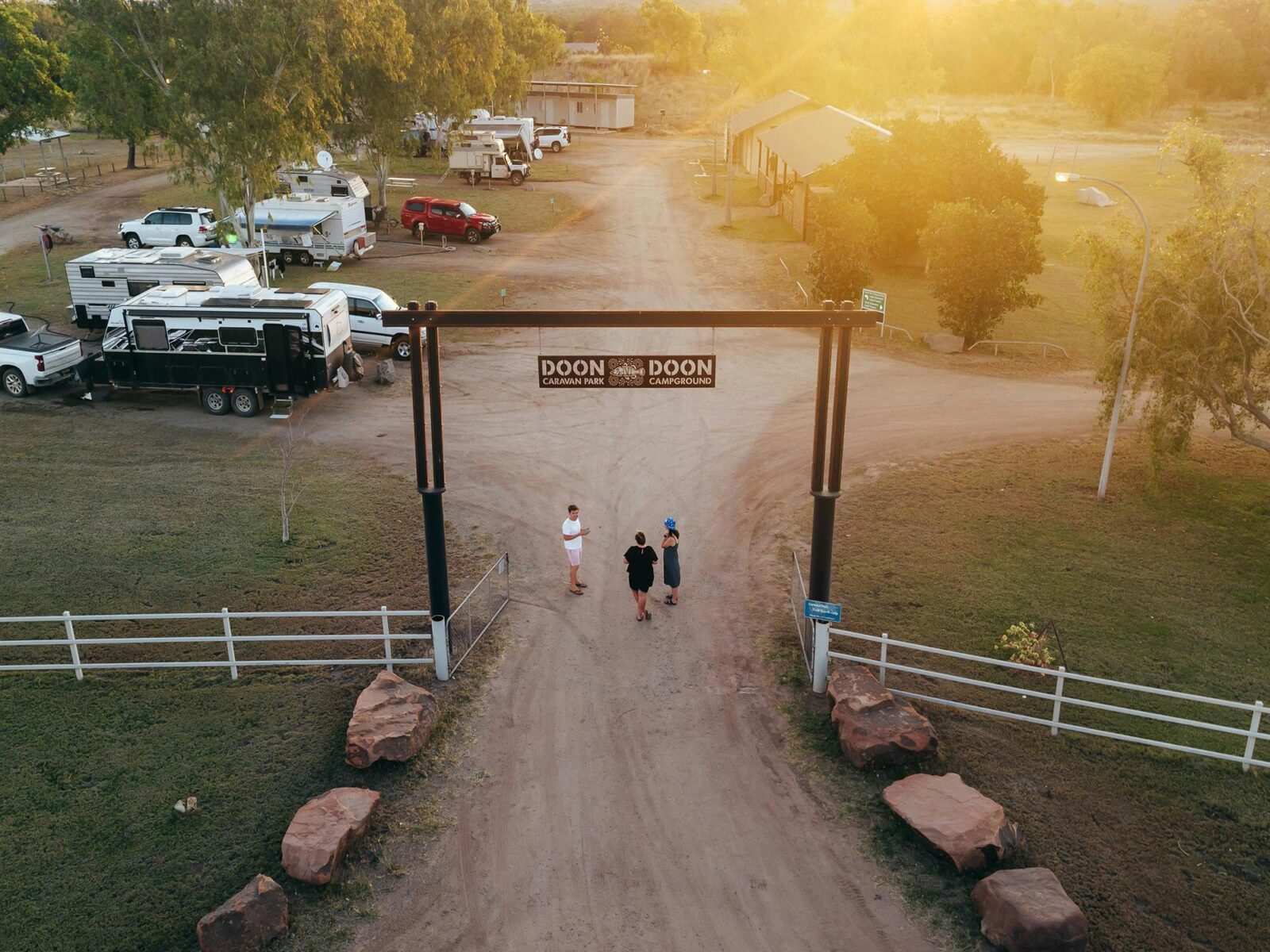 People walking under the entry at Doon Doon Campground