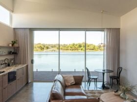Photo showing lake views from kitchen, lounge and deck.