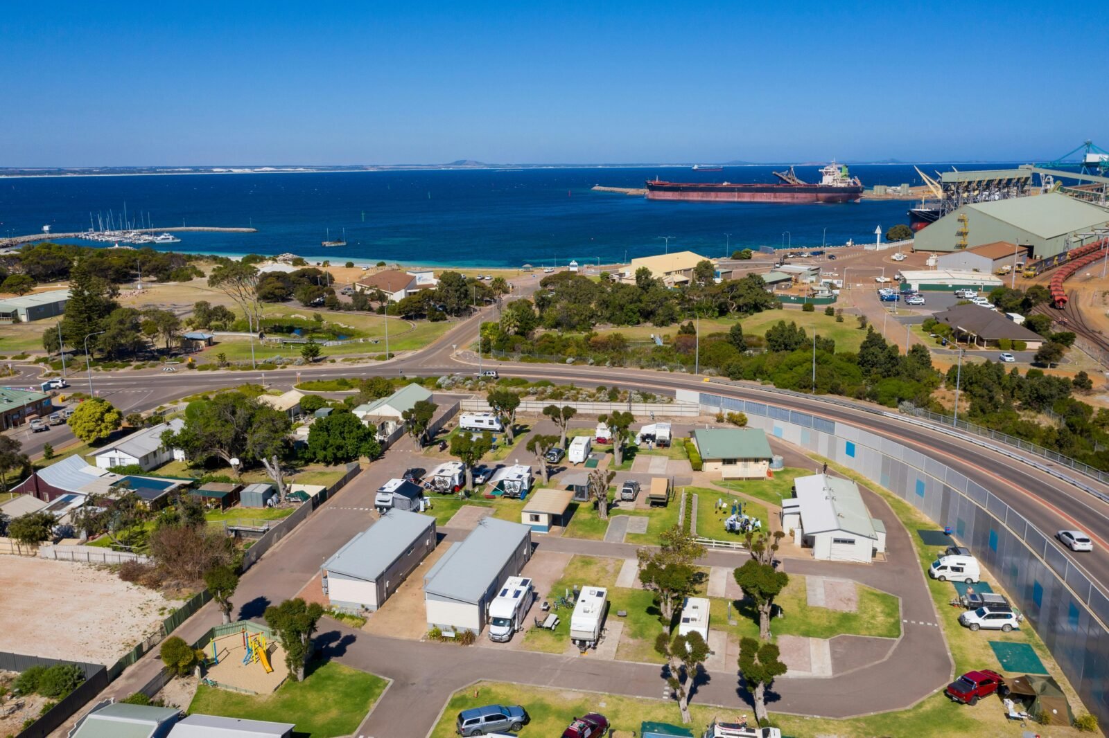 Aerial image shows Esperance Bay Holiday Park close to Esperance port