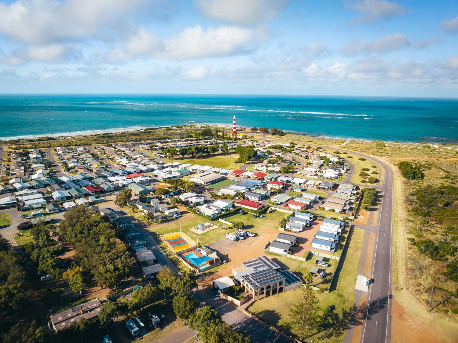 An aerial image shows Geraldton Belair Gardens Caravan Park proximity to the ocean