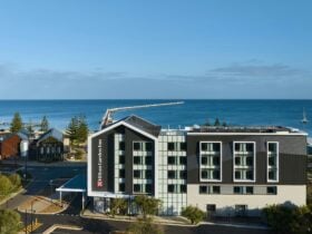 Image depicts our hotel in the foreground looking over the Busselton Jetty and Geographe Bay