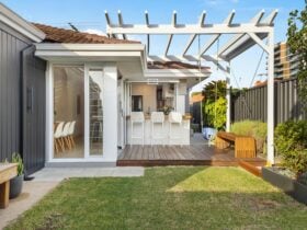 Back yard with deck and grassed area