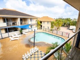 Resort Pool area with BBQ and giant Chess Game