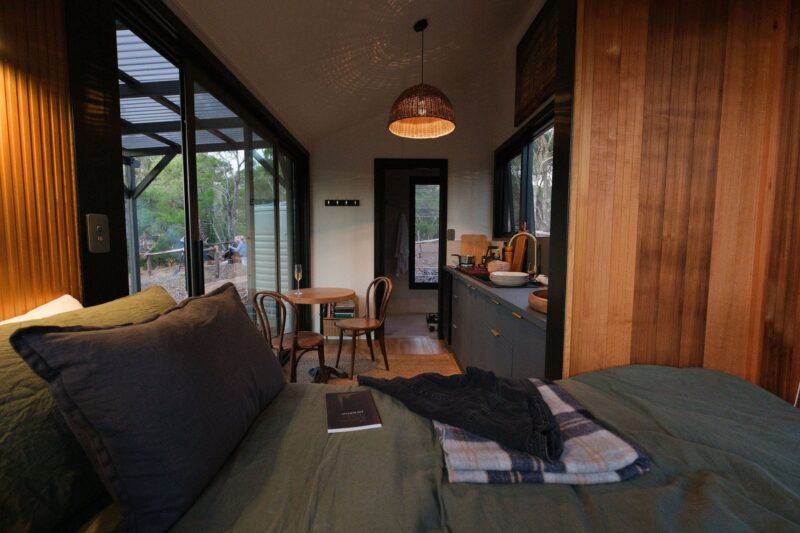 Interior image looking from the bed through to the bathroom