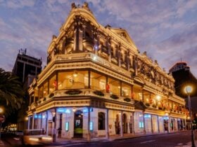 His Majesty's Theatre lit up at dusk.