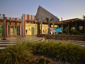 Rockingham Arts Centre illuminated by the twilight sunset