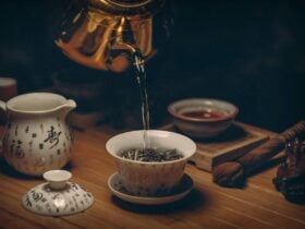 Photo of tea being poured into a teacup