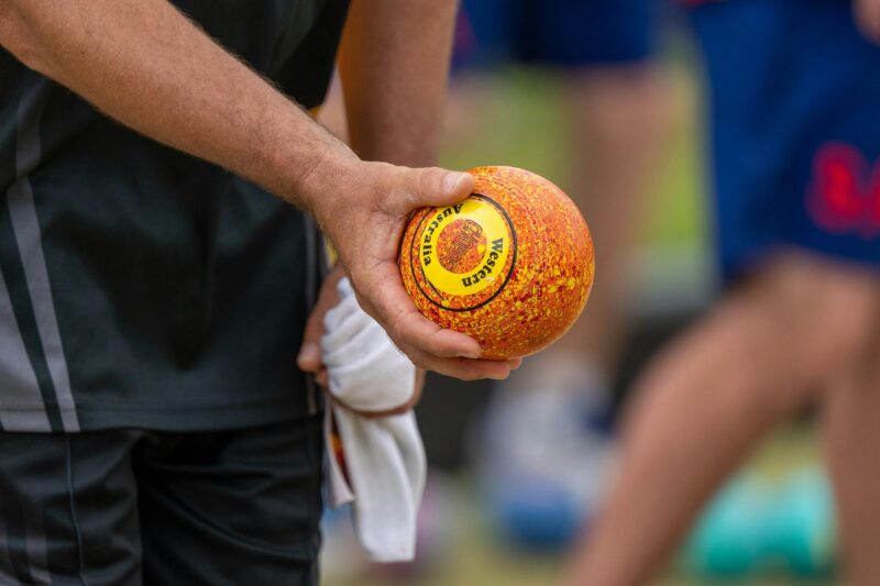 An orange bowl with a Western Australia sticker
