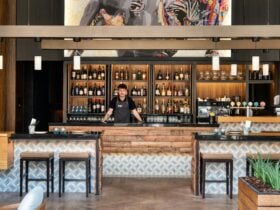 Heno and Rey bar with server standing