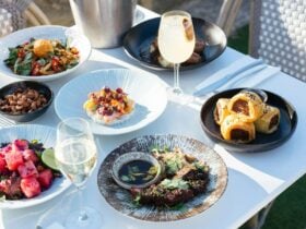 Outdoor table with meals and drinks