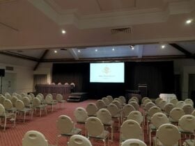 PIcture of a Ballroom set up theatre style