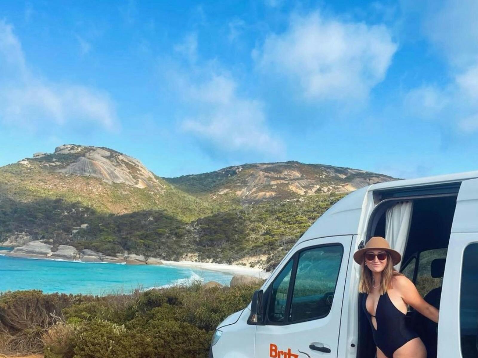 A campervan parked up at a beautiful beach in Western Australia