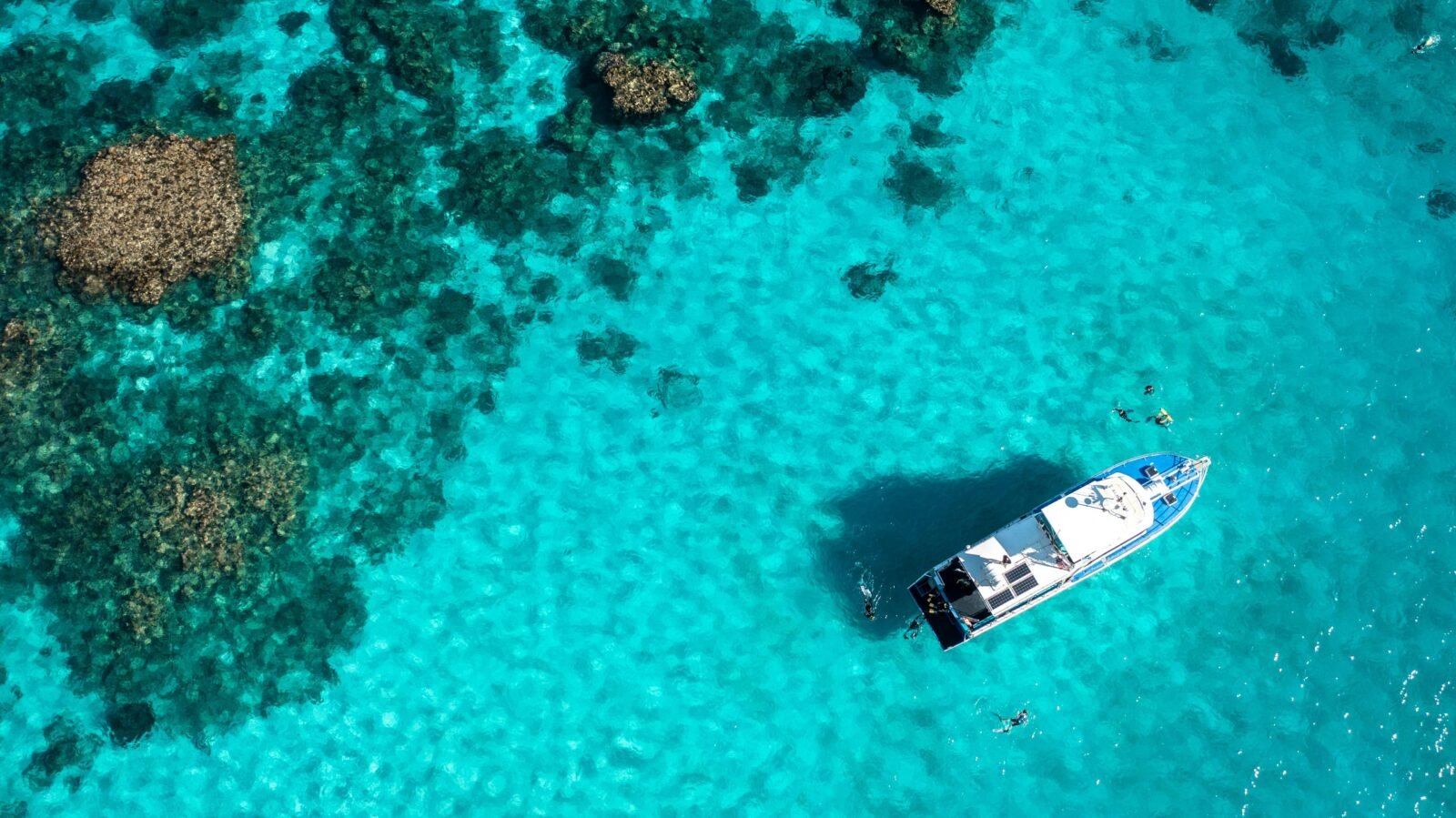 Aerial image of vessel next to Coral Reef