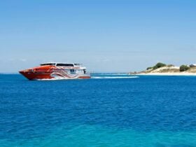 A ferry cruises past Rottnest Island