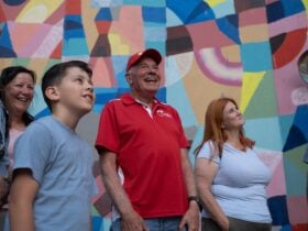 A group is all smiles as they explore the hidden areas of Perth City